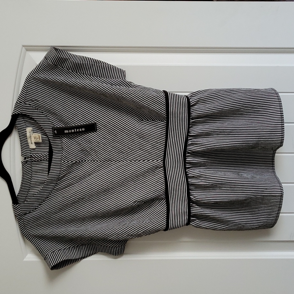Never worn peplum striped top, flattering pattern